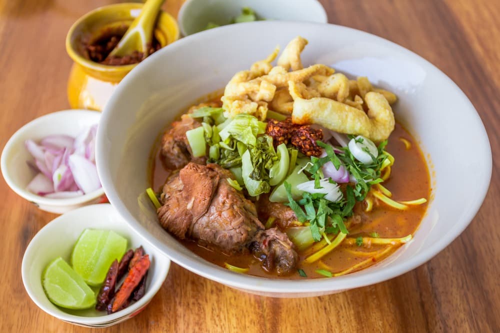 Comment préparer le Khao Soi ? La recette du curry emblématique de Chiang Mai